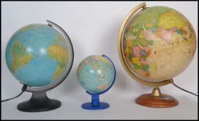 A group of three retro vintage 20th century terrestrial desk globes to include two illuminated