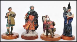 A collection of Royal Doulton porcelain figurines to include Good King Wenceslas HN2118, The