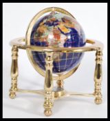 A vintage style lapis lazuli desk top globe having