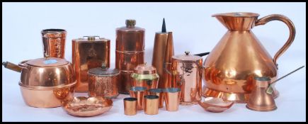 A good collection of brass and copper wares dating from the 19th Century to include chocolate pot,