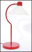 A vintage retro 20th Century red desk lamp, possibly by Terence Conran for Habitat, circular base