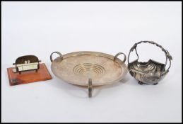 A silver plated Art Nouveau dish by Mappin and Webb together with a desk calendar and tricket bowl /