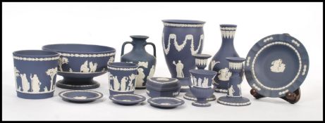 A group of 20th century Wedgwood deep blue jasperware / cameoware. Each having impressed marks to