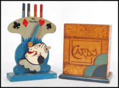 A vintage early 20th century Art Deco card box complete with cards along with a suite pencil