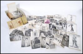 A collection of vintage and retro postcards and photographs, the postcards mainly of European