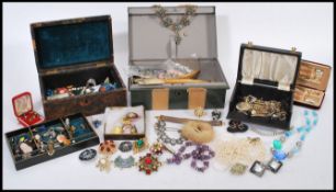 A selection of vintage costume jewellery to include simulation pearls, clip on earrings, beaded