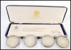 A cased set of four hallmarked silver Winston Churchill medals by Toye Kenning and Spencer in fitted