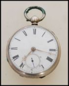 A 19th century Victorian silver hallmarked pocket watch having a fusee movement. The white enamel