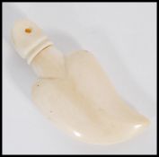 An early 20th century Japanese ivory tear catcher