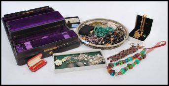 A great collection of vintage 20th Century costume jewellery to include glass beaded necklaces,