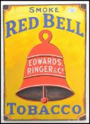A contemporary recreation of a enamel advertising sign for Red Bell Tabaco, the sign hand painted on
