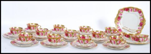 An early 20th century Royal Albert chintz roses pattern tea service. Gilded borders having