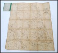 An early 20th Century canvas backed folding pocket road and rail map of the North of England and
