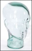 A vintage retro 20th century advertising shop display glass phrenology type head of clear glass