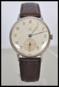 A vintage 1930's Omega gentleman's jumbo oversized watch circa WWII, having a round face in a