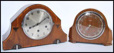 Two vintage early 20th century mantel clocks to include an oak cased eight day Smiths example and