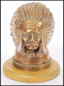 A vintage 20th Century Guy Motors Ltd car mascot / radiator cap modelled as a Native American Indian