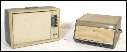 A vintage 20th Century circa 1960's Corvette fall front portable four speed record player together