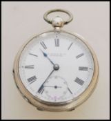 A 19th century Victorian silver hallmarked pocket watch having a fusee movement. The white enamel