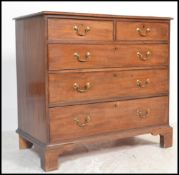 A George III 19th century mahogany 2 over 3 chest of drawers being raised on bracket feet with 2