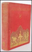 An early 20th Century edition of 'Alice's Adventures in Wonderland' by Lewis Carol Centenary