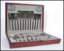 A vintage 20th Century cased silver plate / stainless steel canteen of cutlery by Viners, the six