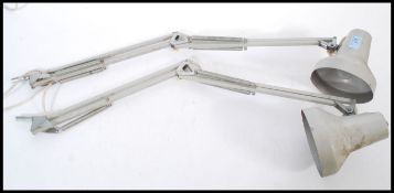 A pair of vintage retro 20th century Industrial wall mounted anglepoise lamps having conical pendant