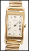 A gentleman's hallmarked 375 9ct gold Rotary Incabloc square faced watch having Roman Numerals to