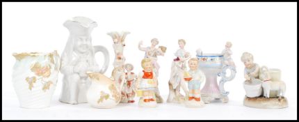 A collection of late 19th / early 20th Century Continental figurines to include females and males