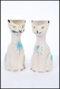 A pair of unusual retro 1960's Arthur Wood 'Smoky' ceramic vases in the form of cats with hand