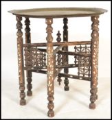 An early 20th century Colonial period Raj Anglo-Indian Benares table having a mother of pearl inlaid