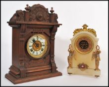 An early 20th Century American Ansonia Clock Company of New York oak two train architectural