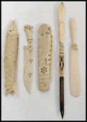 A 19th century collection of bone folding carved letter openers to include one in the form of a