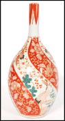 A Japanese satsuma onion vase, possibly Gyokuzan, Meiji Period (1868-1912). The bulbous body