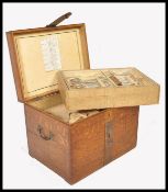 A 19th century Victorian oak and iron clasped silver strong boxÿ canteen chest. Solid golden oak