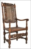 A 17th Century oak carved armchair / chair. The chair with carved top rail over barleytwist turned