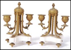 A pair of 19th century Victorian marble and gilt metal ormulu twin branch stub table candelabra.Each