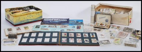 A collection of cigarette and tea cards dating from the 1920's to include Wills Cigarettes First Aid