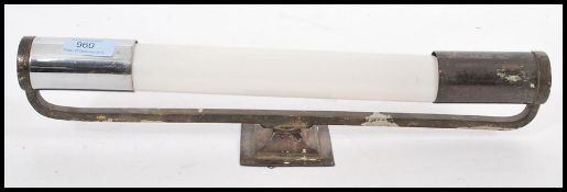 A vintage retro 20th century Art Deco tube light wall fixed light having chrome ends with long glass