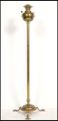 A 19th century Victorian Young's Central Draught standard oil lamp of brass construction. The