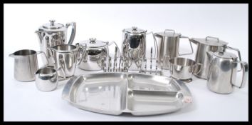 A collection of vintage retro 20th century New Hall stainless steel wares to include teapots, bowls,