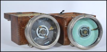 A pair of oak cased vintage 20th Century Pigeon cl