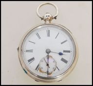 A 19th century Victorian silver hallmarked pocket watch having a fusee movement. The white enamel