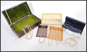 A collection of eight pearl and faux pearl necklaces, the necklaces dating from the first half of