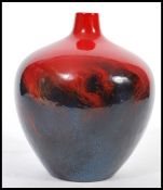 A vintage early 20th century Royal Doulton Veined Flambe vase of globular baluster form. Stamped