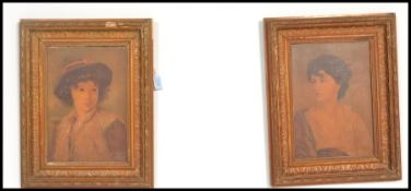 A pair of 19th Century framed oleograph prints depicting a man and a lady in carved wood and gesso
