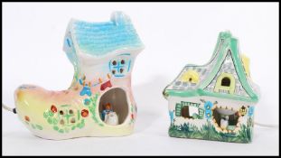 Two novelty ceramic children's lights to include the old woman who lived in a shoe boot lamp with