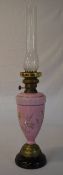 Oil lamp with a pink floral base