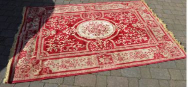 Large red ground Persian style rug