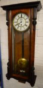 Large single weight Vienna wall clock with brass pendulum,
